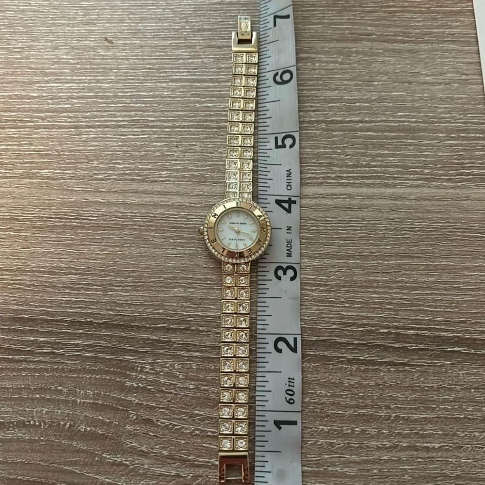 Anne Klein Gold Plated Rhinestone Bling Watch Water Resistant Logo Face 7” Dress